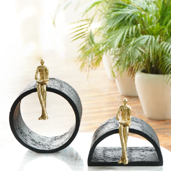 Black & Gold Semi-Circular Focused Sitting Figure Sculpture