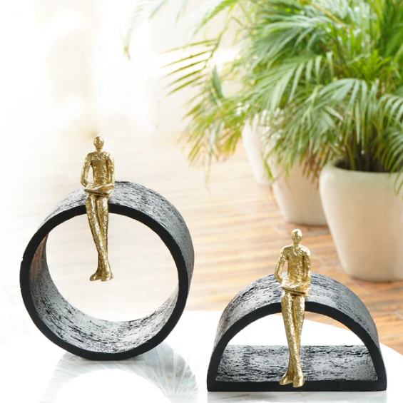Black & Gold Circular Focused Sitting Figure Sculpture