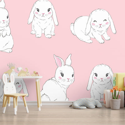 White cute rabbit poses